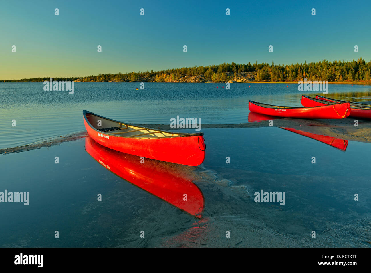 Canoes on shore of Long Lake, Fred Henne Territorial Park, Yellowknife, Northwest Territories, Canada Stock Photo