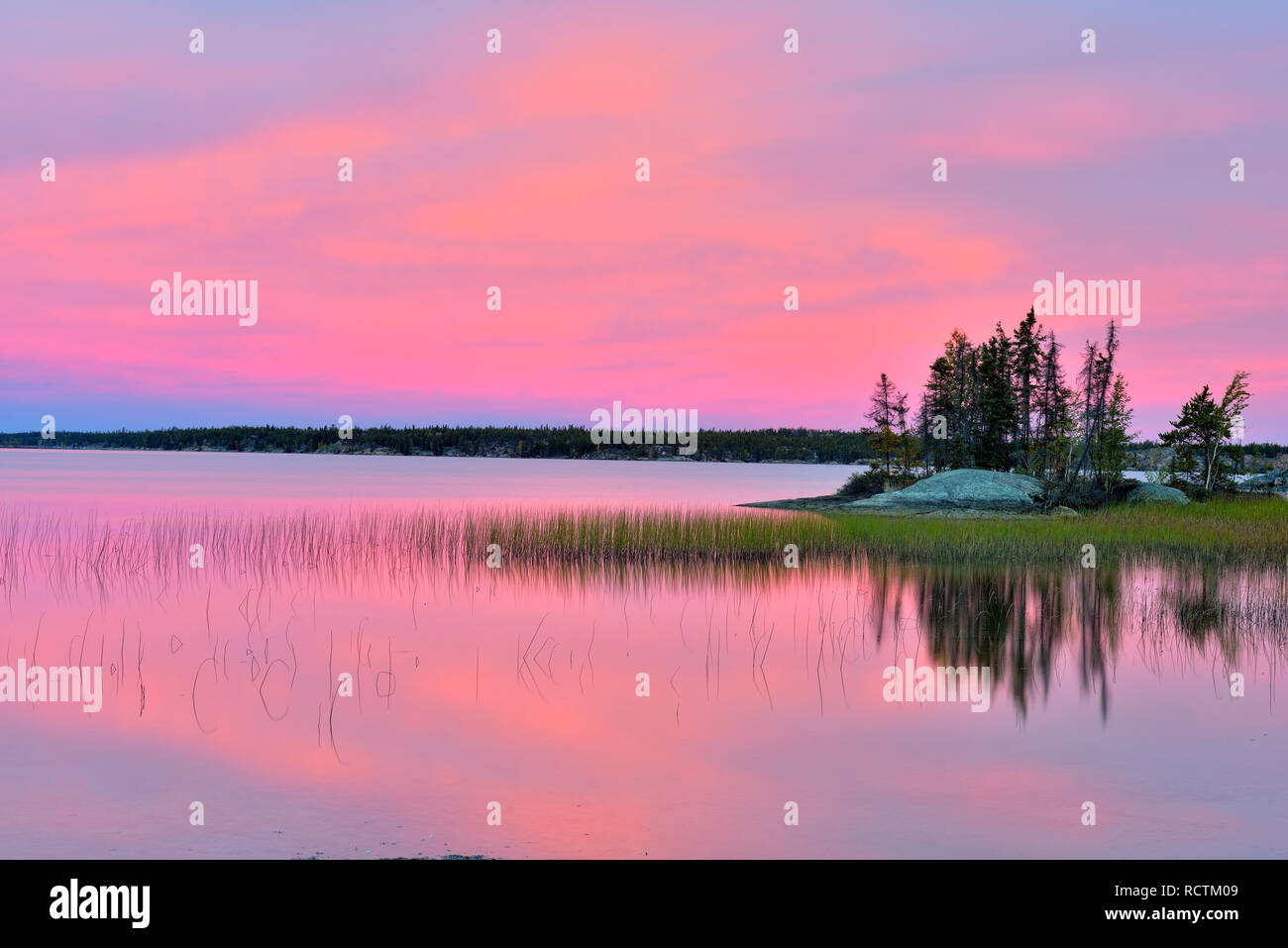 Sunset colour on Long Lake, Yellowknife, Fred Henne Territorial Park, Northwest Territories, Canada Stock Photo