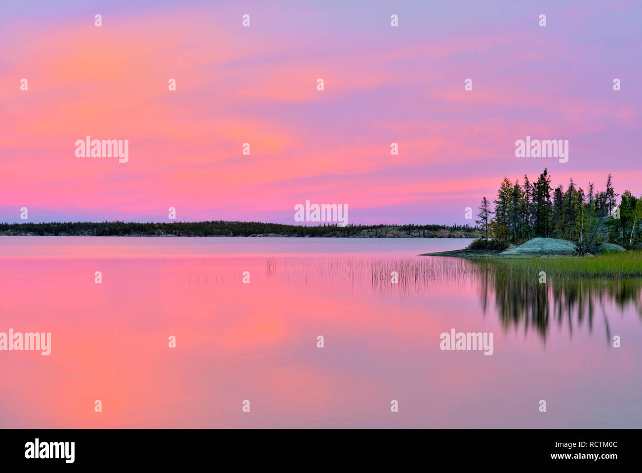 Sunset colour on Long Lake, Yellowknife, Fred Henne Territorial Park, Northwest Territories, Canada Stock Photo