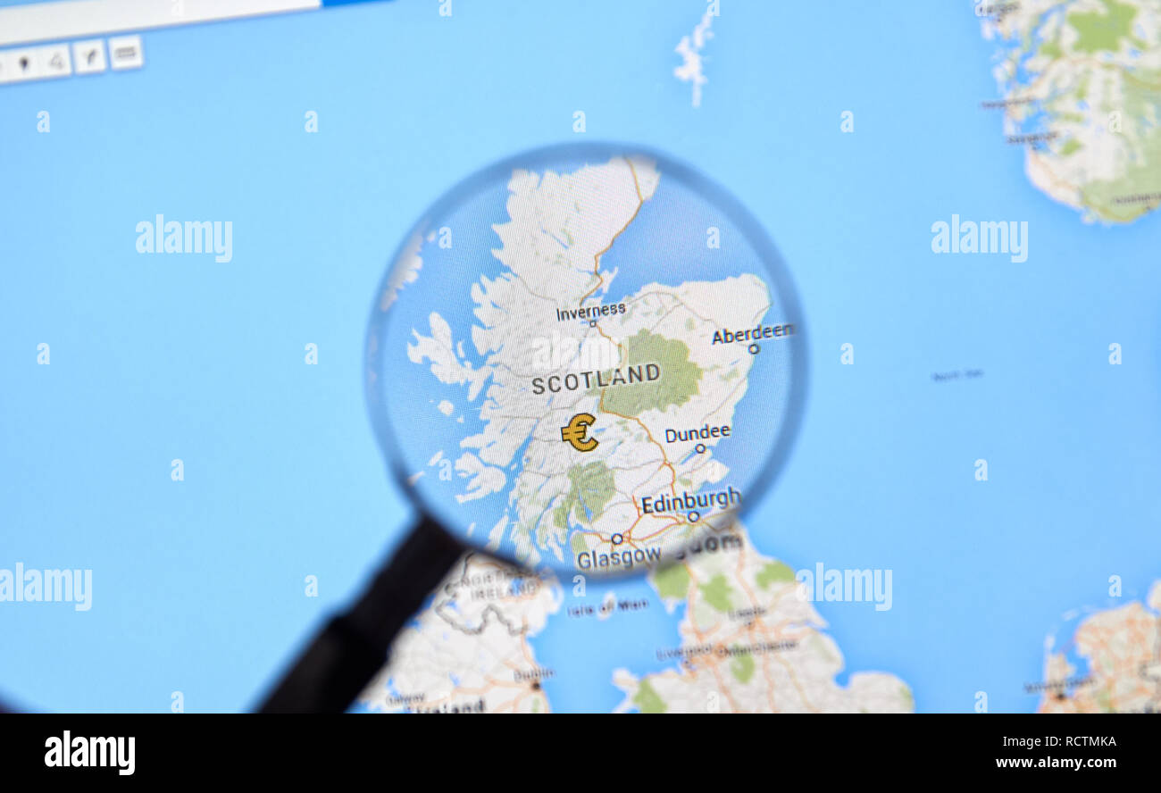 MONTREAL, CANADA - JUNE 24, 2016 - Scotland on Google Maps app under magnifying glass. Scotland is a european country and a par of EU. Stock Photo