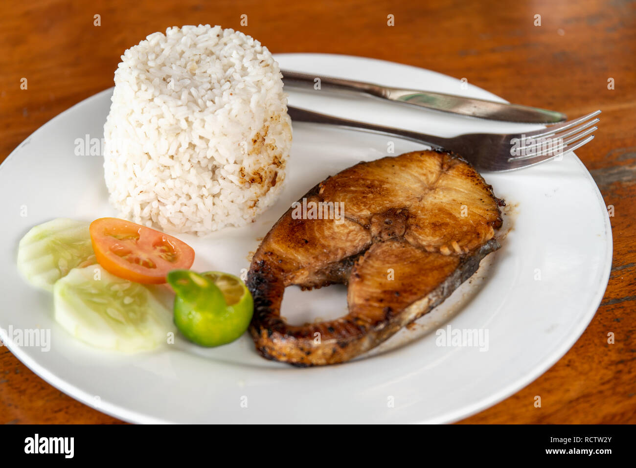 Fish Steak Rice Filipino food : steak tuna with rice Stock Photo - Alamy