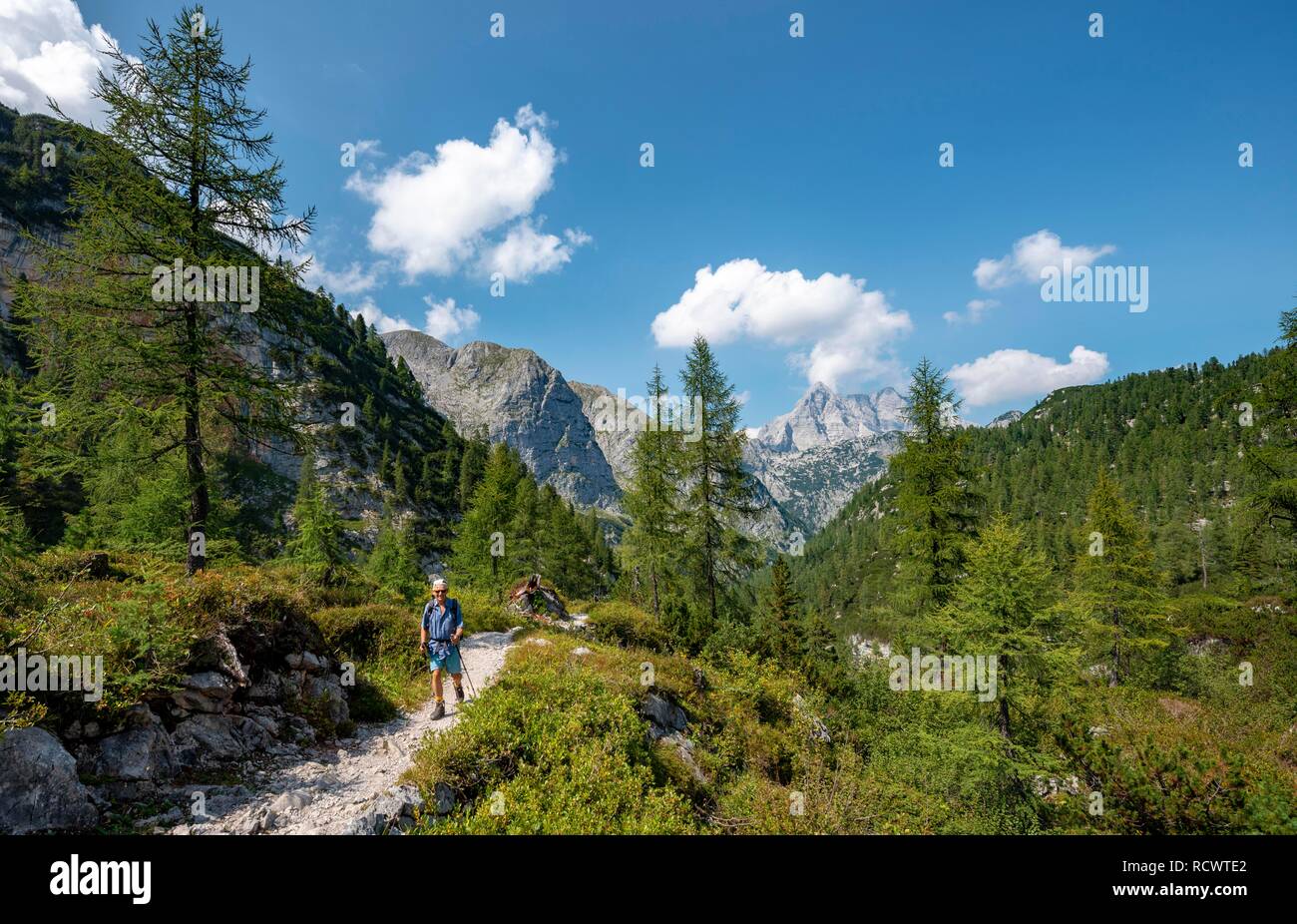 hiker-on-hiking-trail-to-k-rlingerhaus-behind-watzmann-k-nigssee