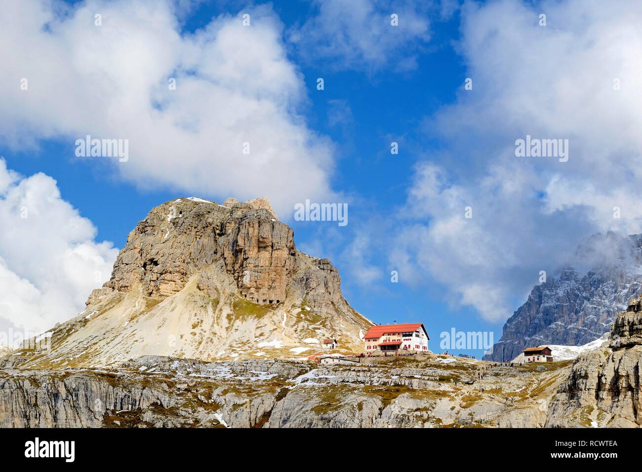 Three peaks hut 2405 m, Sextnerstein, cloudy sky, Sexten Dolomites, province South Tyrol, Alto-Adige, Italy Stock Photo
