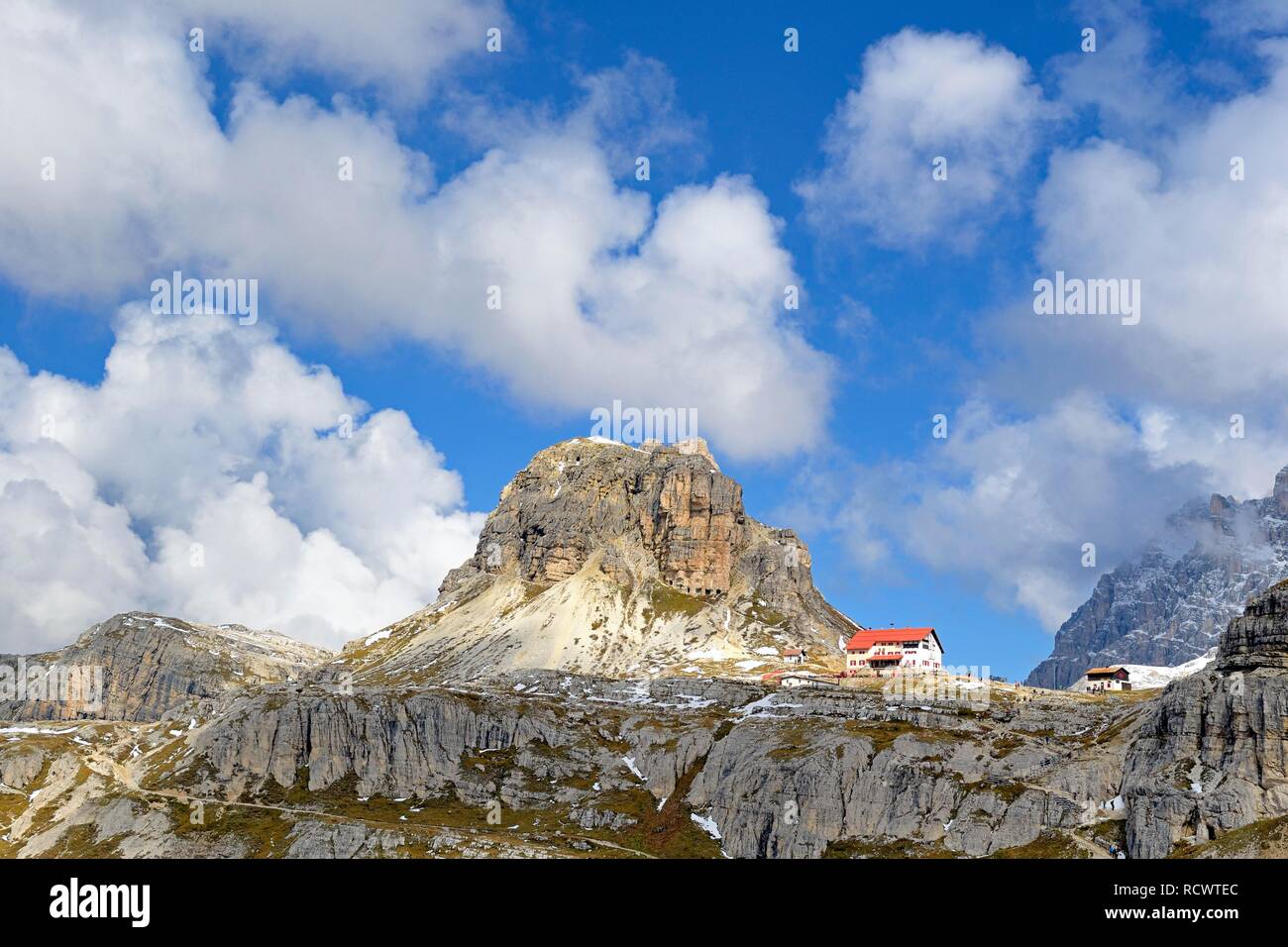 Three peaks hut 2405 m, Sextnerstein, cloudy sky, Sexten Dolomites, province South Tyrol, Alto-Adige, Italy Stock Photo