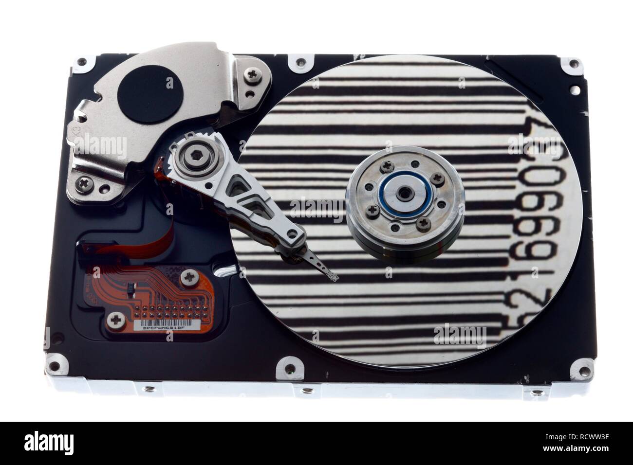 Computer hard drive, opened, readwrite head on the disk, bar code