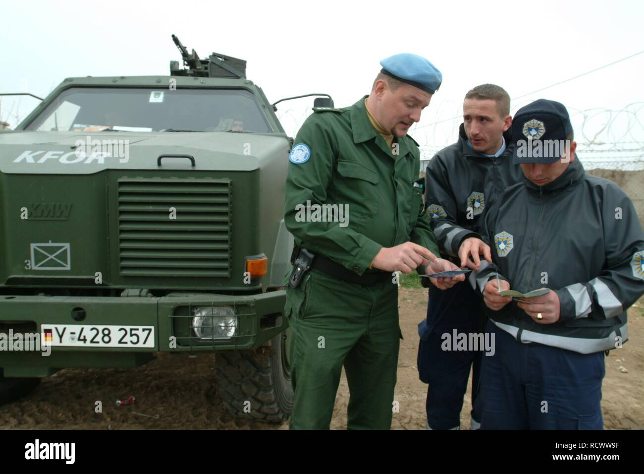 Joint checkpoint of the German KFOR Bundeswehr forces, and the international police forces, checking of vehicles and their Stock Photo