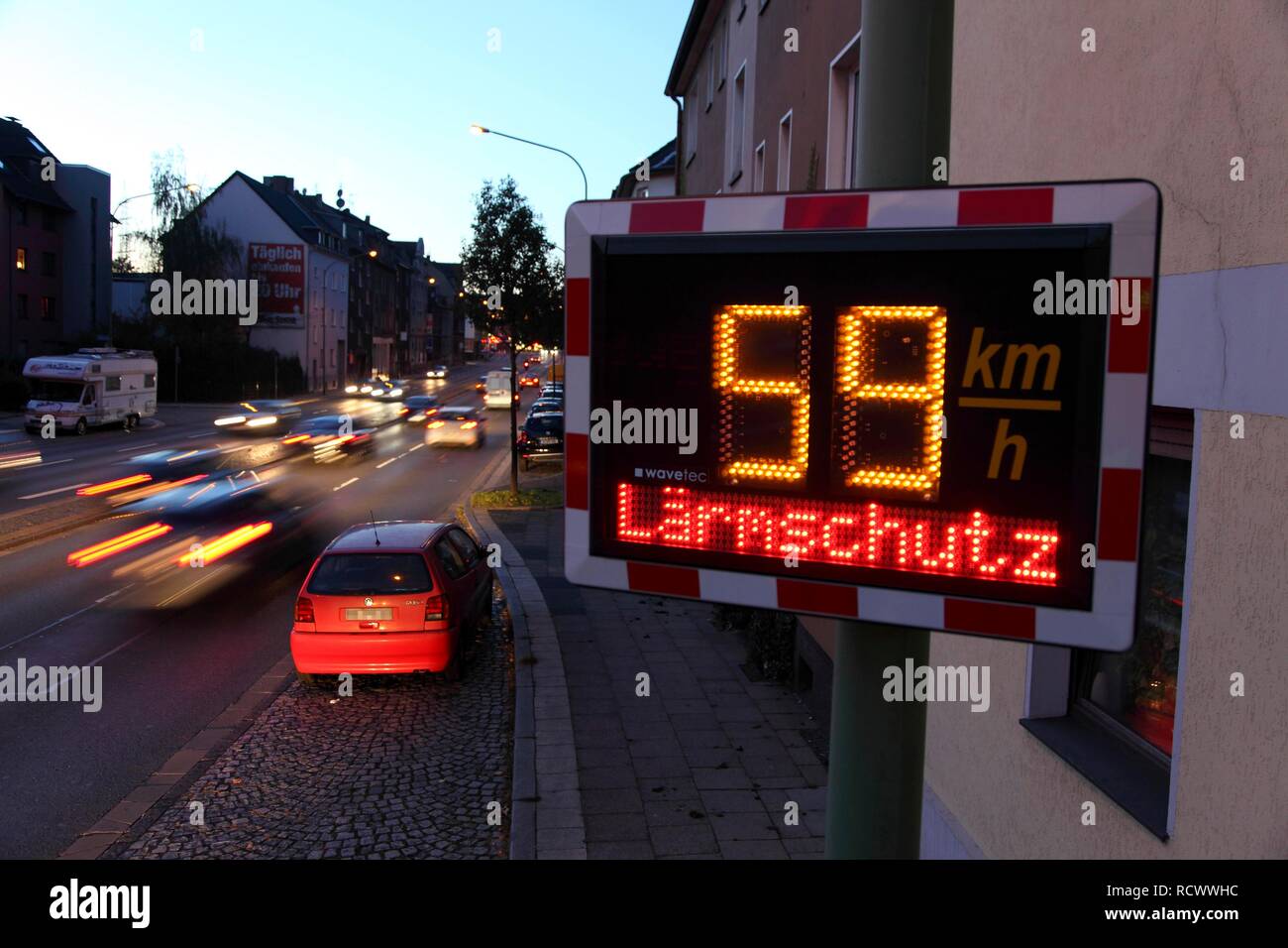 Road traffic noise, display panel displaying the speed of vehicles, if speed is in excess of 50 kph, the word 'Laermschutz', Stock Photo