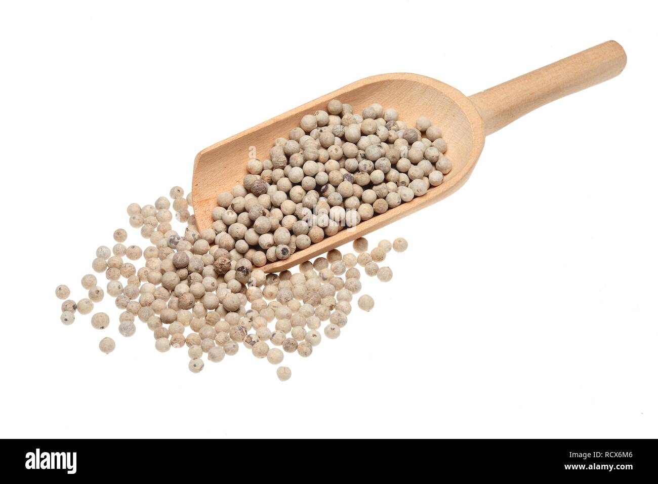 White pepper in a wooden scoop Stock Photo