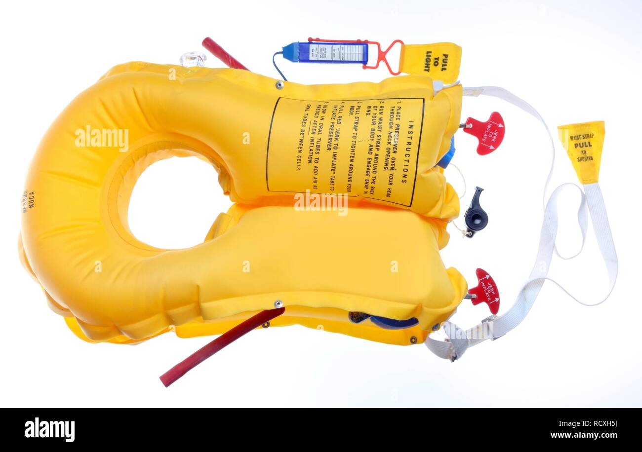 Life jacket from a plane, with air valves, two compressed air cartridges, a  whistle and a signal light Stock Photo - Alamy