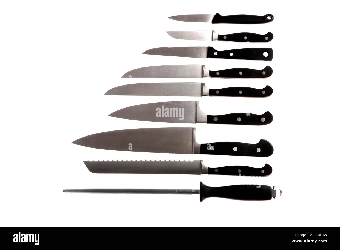 Various kitchen knives, sharpening steel, chef's knife, bread knife