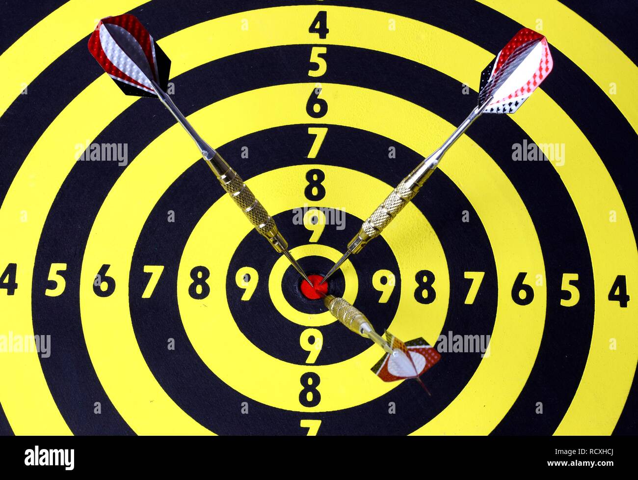 Darts, throwing game, darts sticking into the middle of the dartboard