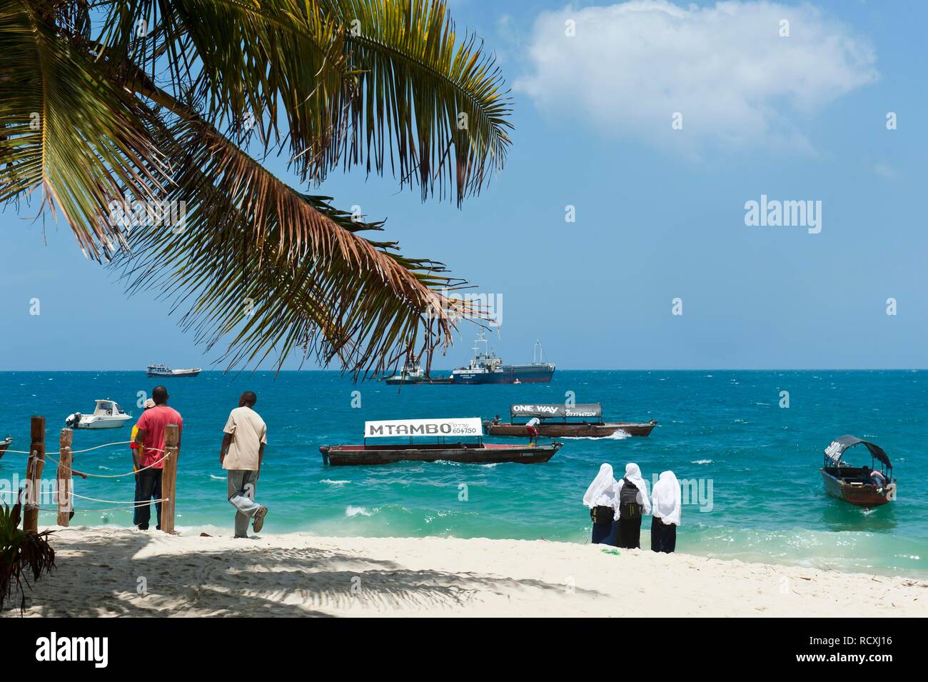 People on the City Beach, sandy beach Beach, Stone Town, Stonetown, Zanzibar City, Zanzibar, Tanzania Stock Photo
