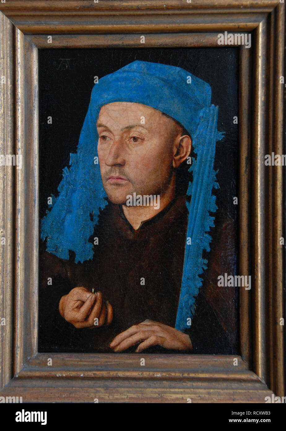 Portrait of a man with a blue chaperon (Man with Ring). Museum: Muzeul National Brukenthal, Sibiu. Author: VAN EYCK, JAN. Stock Photo