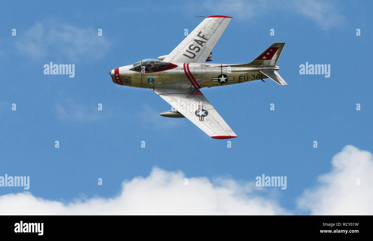 North American F-86 Sabre, transonic swept wing jet fighter from the Korean War performs at air show Stock Photo