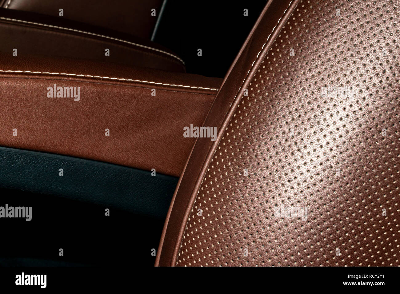 Modern luxury Car brown leather interior. Part of leather car seat