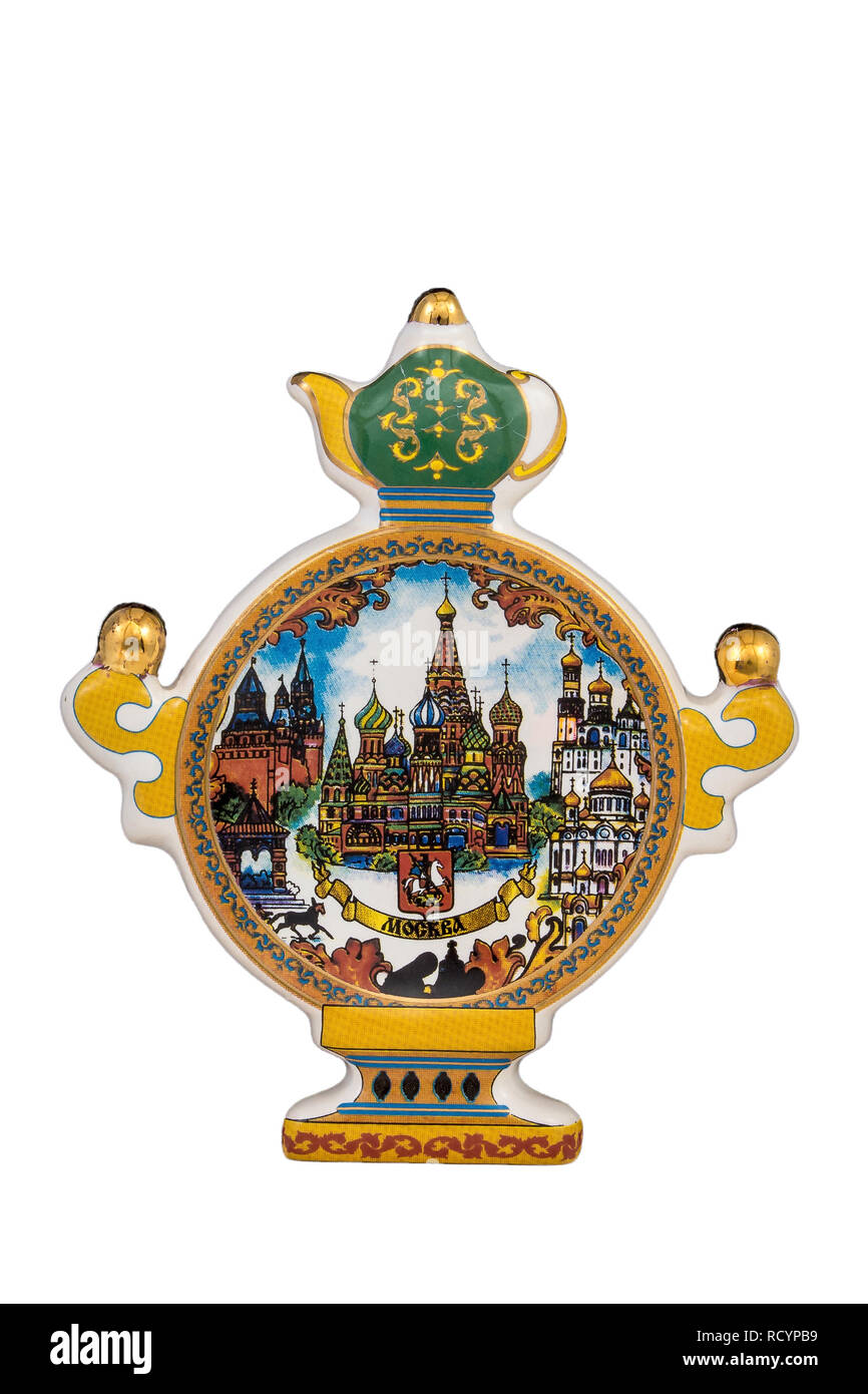 ceramic souvenir toy in the form of samovar with beautiful color painting on isolated white background reflecting the national Russian culture with th Stock Photo