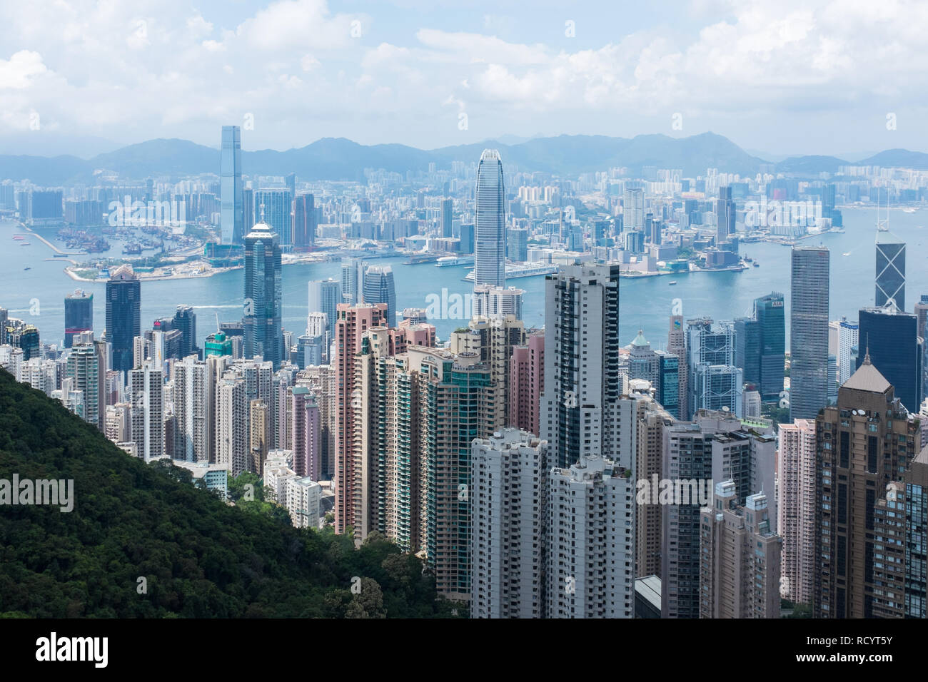 Looking down on high rise apartment blocks and offices in Hong Kong Stock Photo