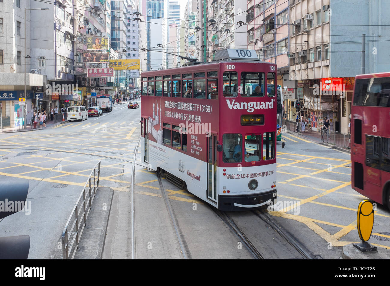 Tram travelling through the Central District in Hong Kong Stock Photo