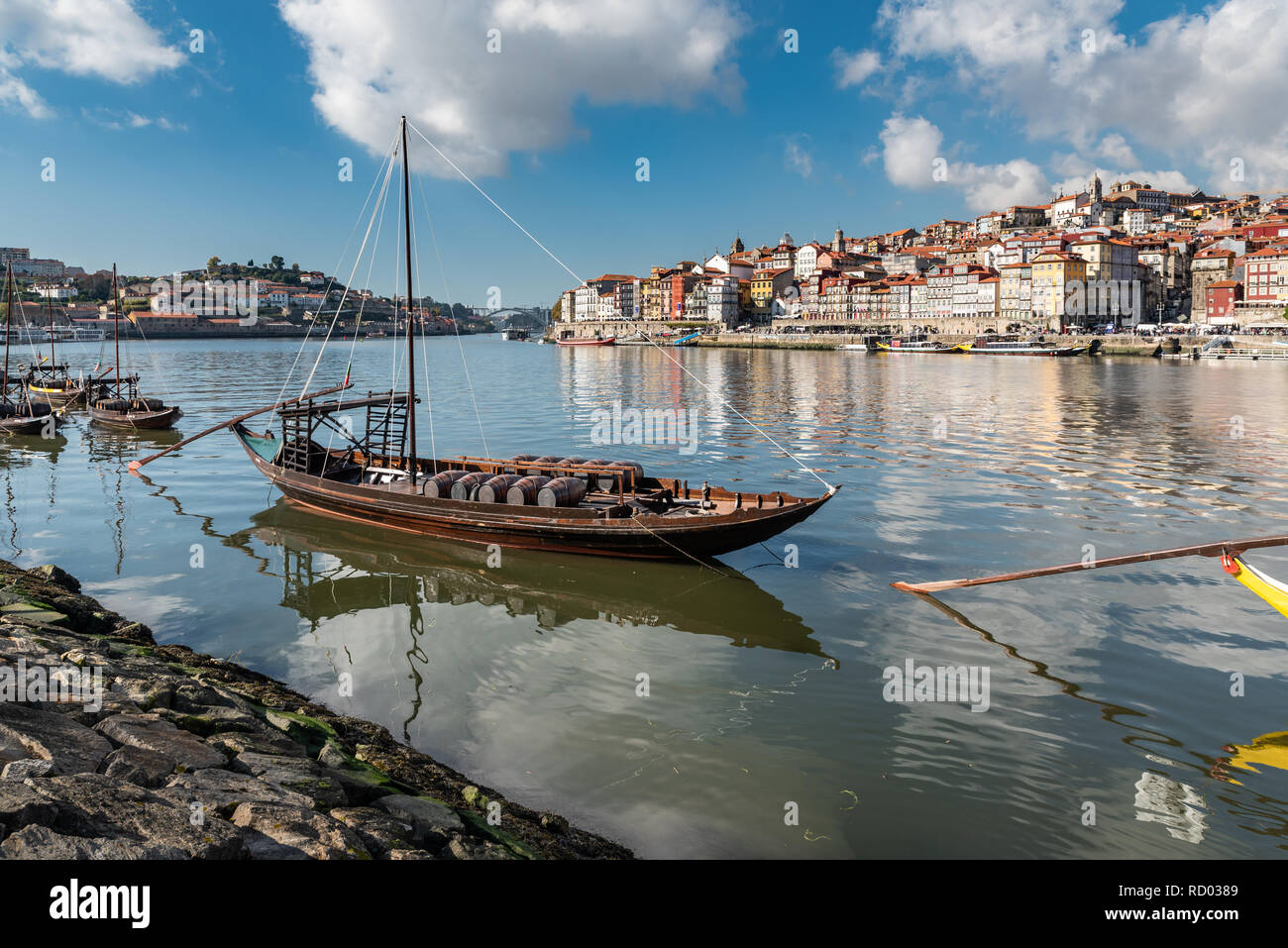 Port wine storage warehouses and transport boats at river Duoro in Vila Nova de Gaia opposite
