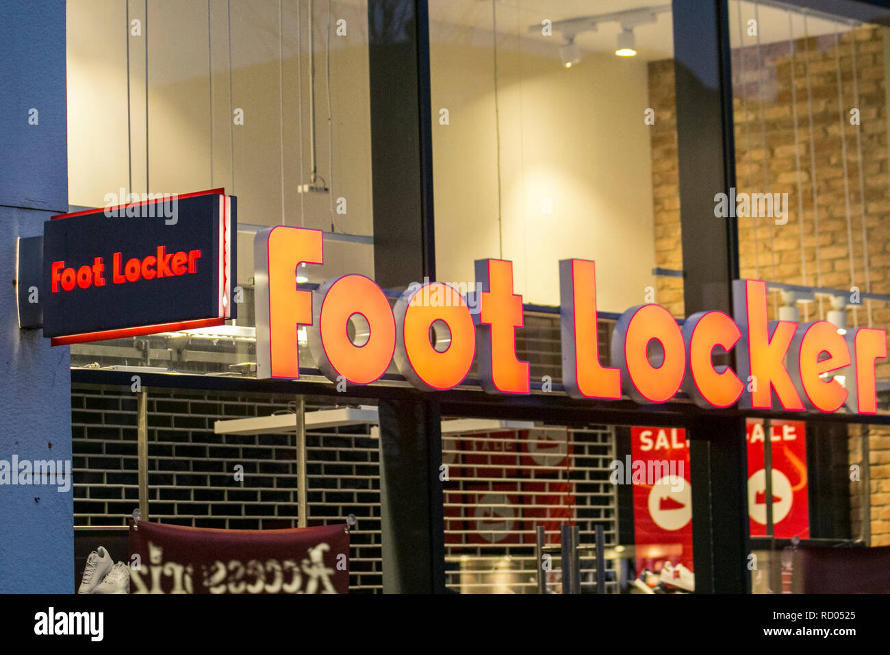 Footlocker illuminated shop signs in Preston City Centre, UK Stock