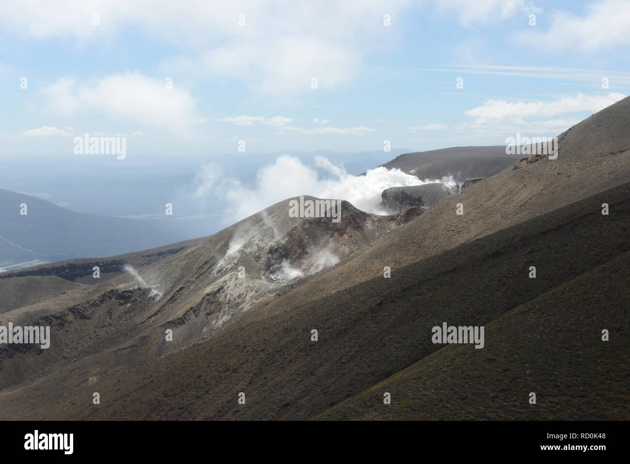 Sulphur rising from mountains, Tongariro National Park, North Island, New Zealand Stock Photo