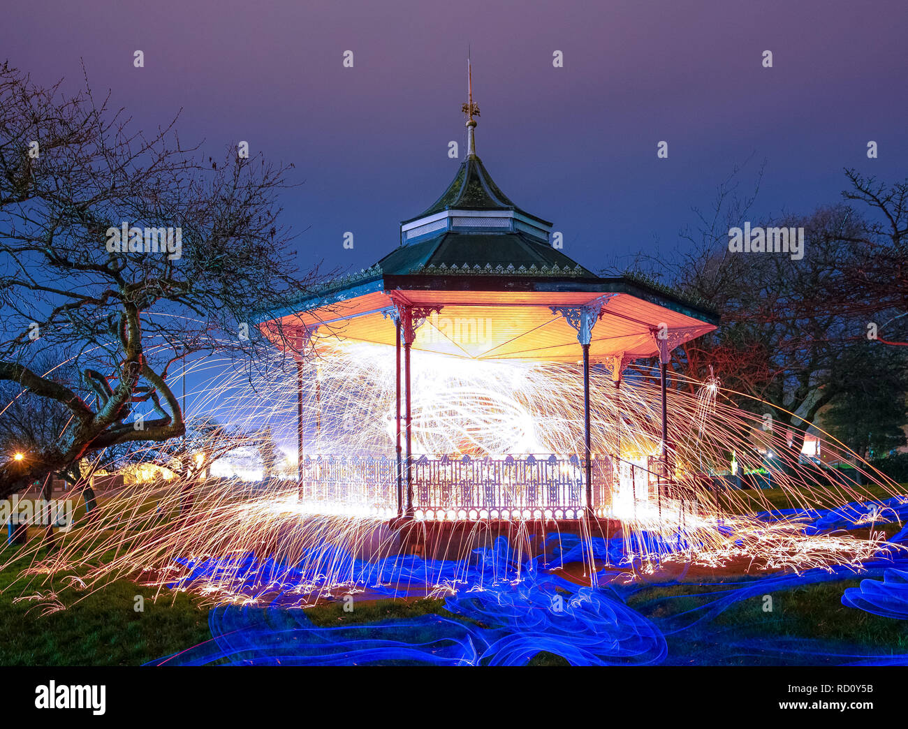 Spinning wire wool and using long exposure to create sparks and colour