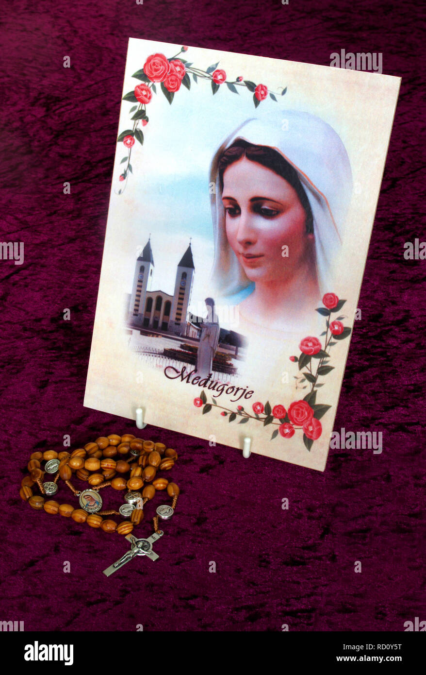 Painting of the Virgin Mary at Medjugorje, Bosnia & Herzegovina & Roman Catholic Rosary Beads Stock Photo