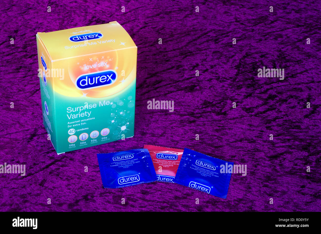 Box of Assorted Latex Rubber Condoms, a Form of Contraception Stock Photo