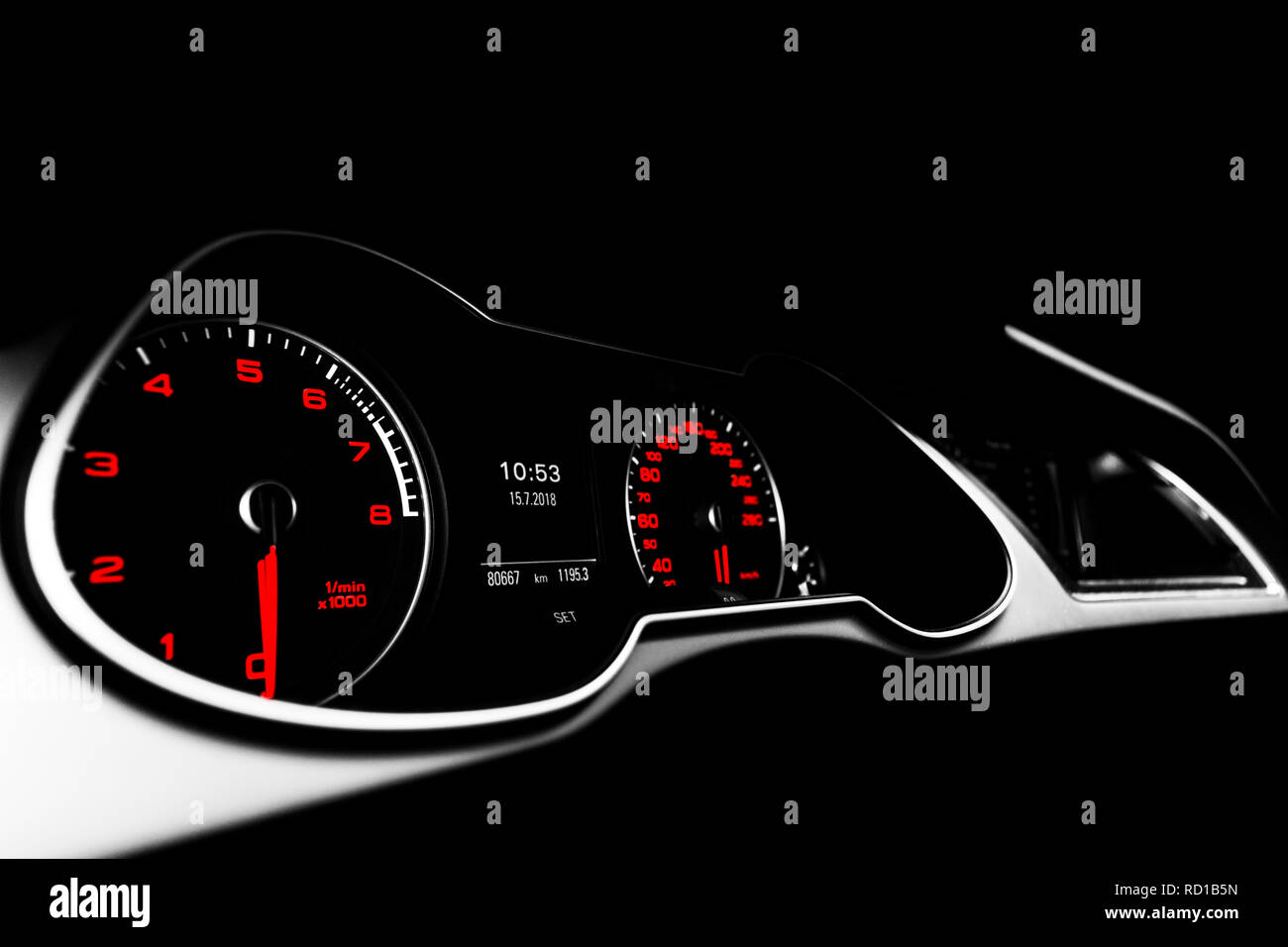 Close up shot of a speedometer in a car. Car dashboard. Dashboard details with indication lamps