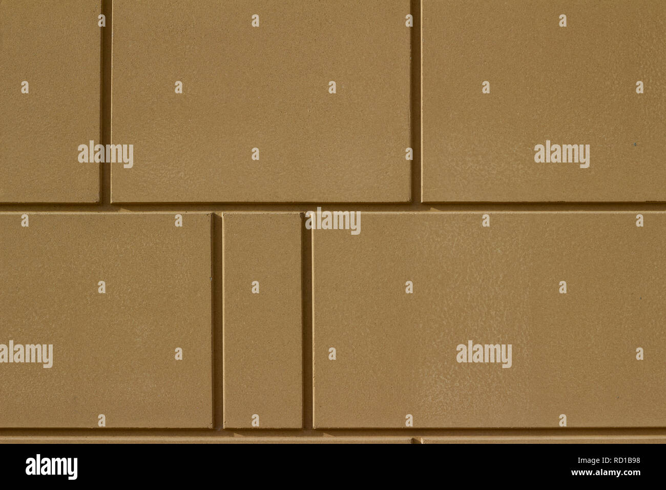 Light brown color smooth textured modern stone tile wall background Stock Photo