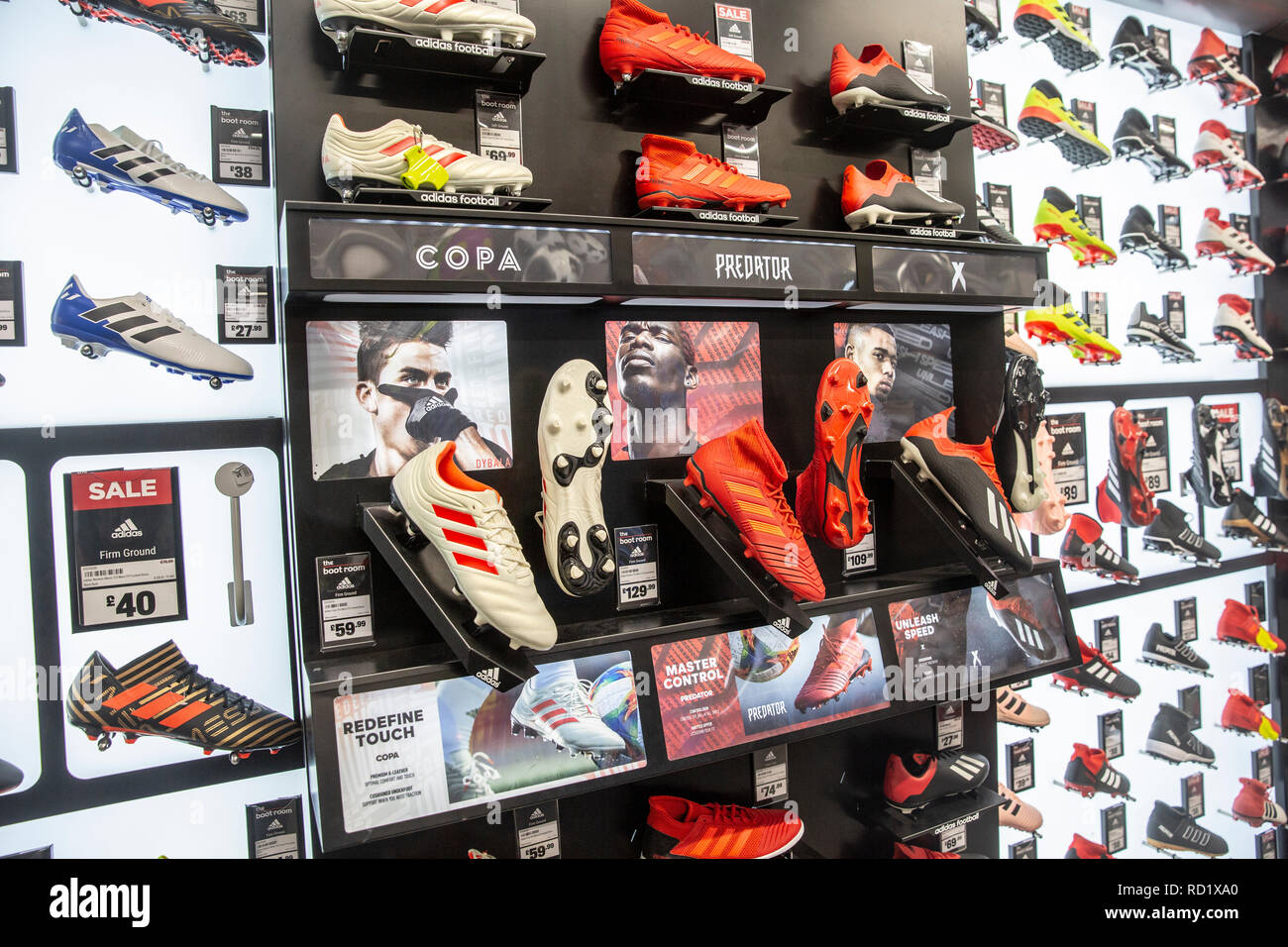 Adidas predator football soccer boots on sale in a UK sports shop,England Stock Photo