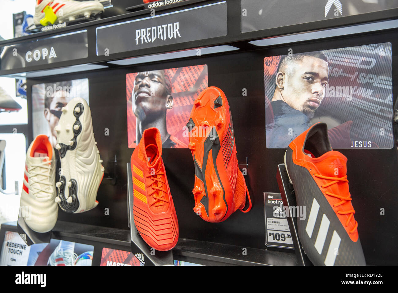 predator football soccer boots on sale in a UK sports shop,England Stock Photo -