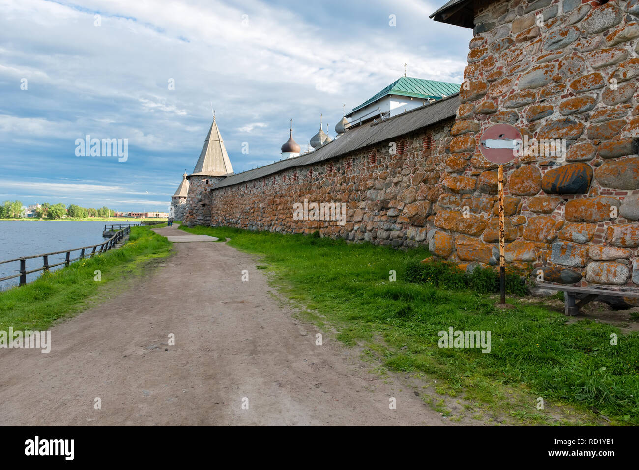 The road along the fortress wall of the Transfiguration Solovki monastery. Russia, Arkhangelsk region, Primorsky district, Solovetsky village Stock Photo