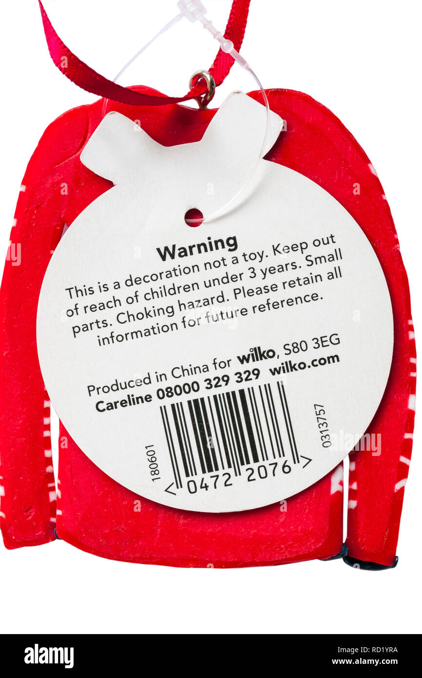 Warning information on tag label of hanging Christmas decoration set on