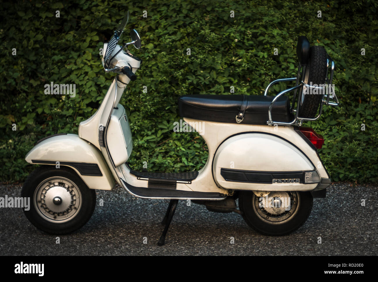 vespa piaggio 50 cc special 125 px white parking Stock Photo - Alamy