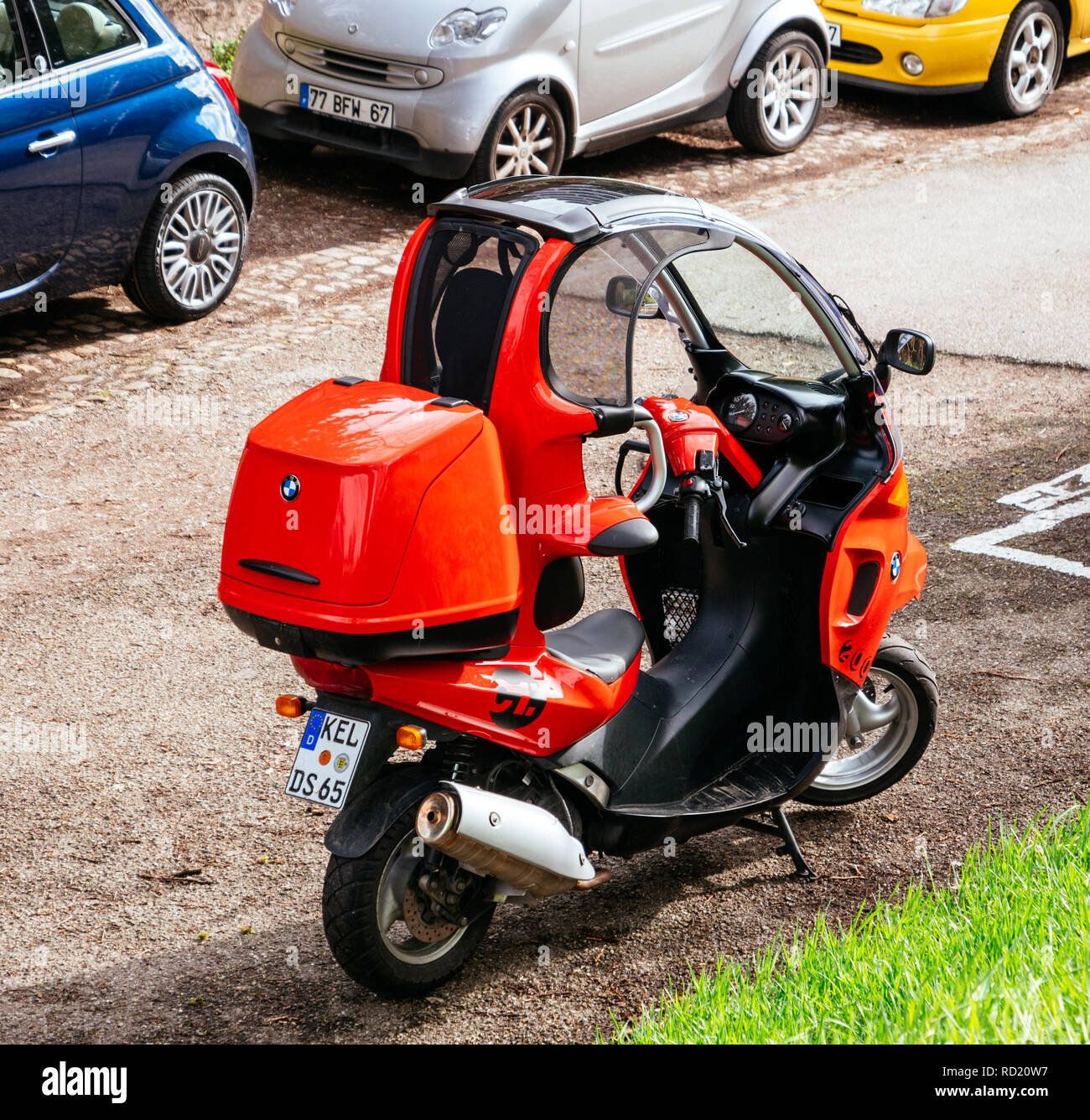 PARIS, FRANCE - CIRCA 2018: BMW C1 enclosed scooter manufactured by Bertone  for BMW - red on the street view from above on French street Stock Photo -  Alamy