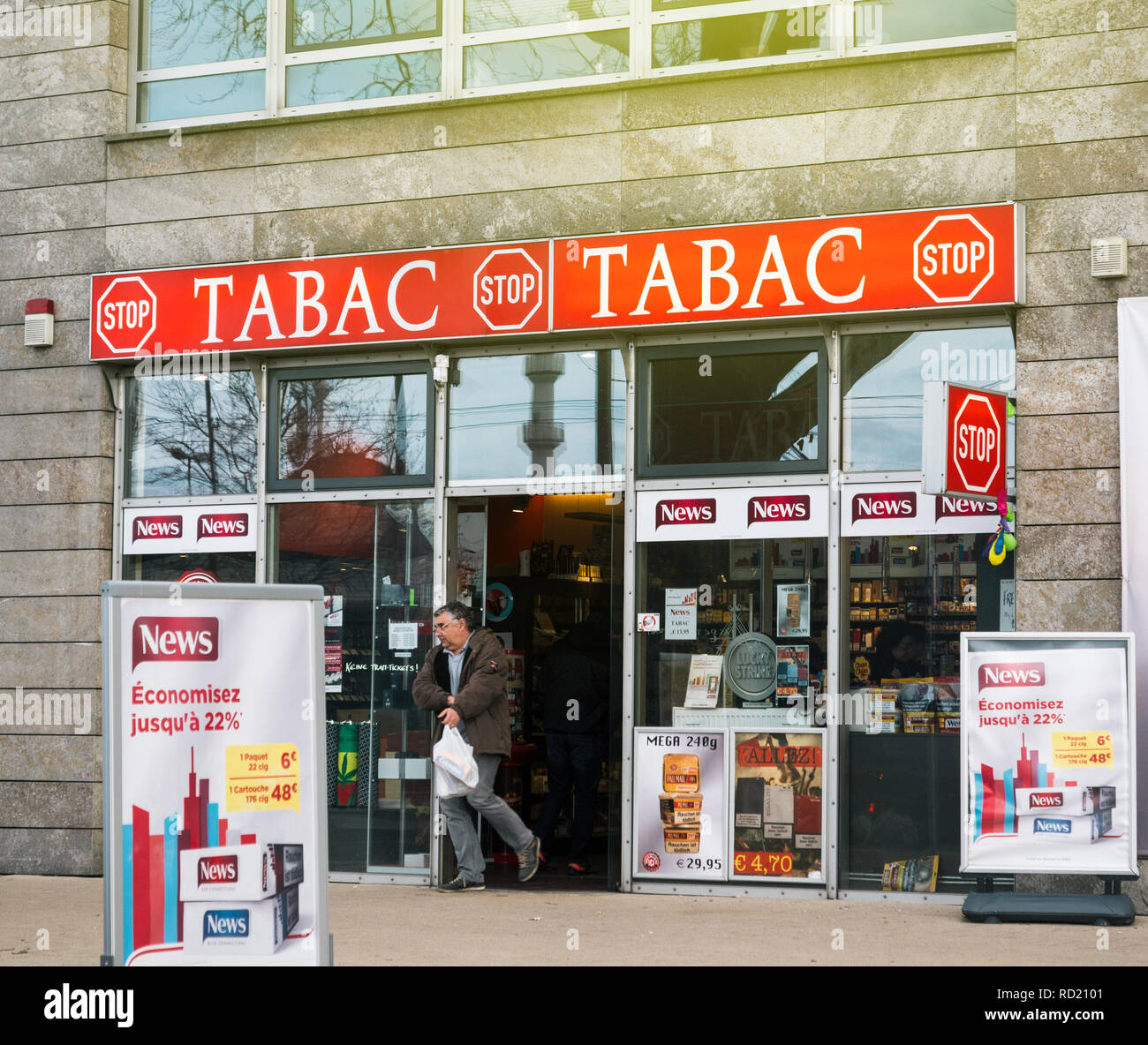 KEHL, GERMANY - MAR 29, 2018: Border shopping - man exit German taback