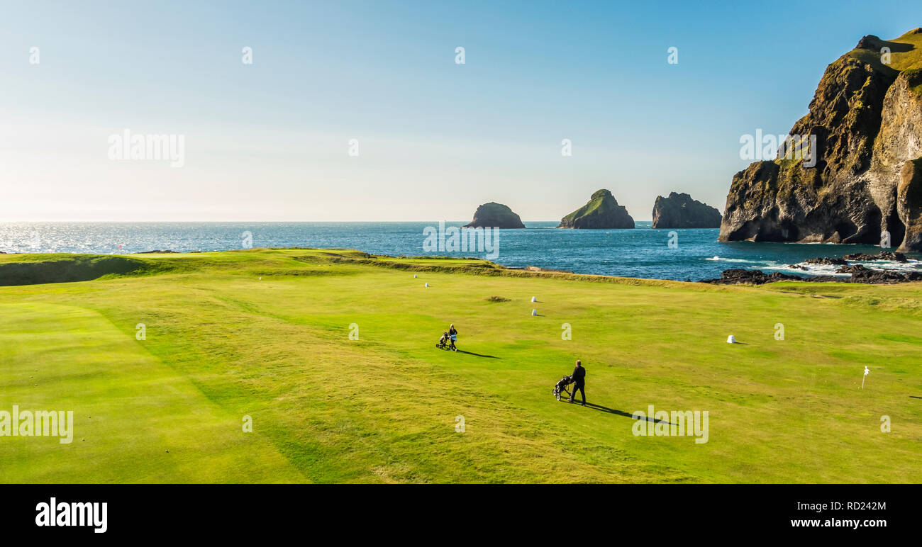 People playing Golf. Vestmannaeyjar Golf Course, Heimaey, Westman Islands, Iceland Stock Photo