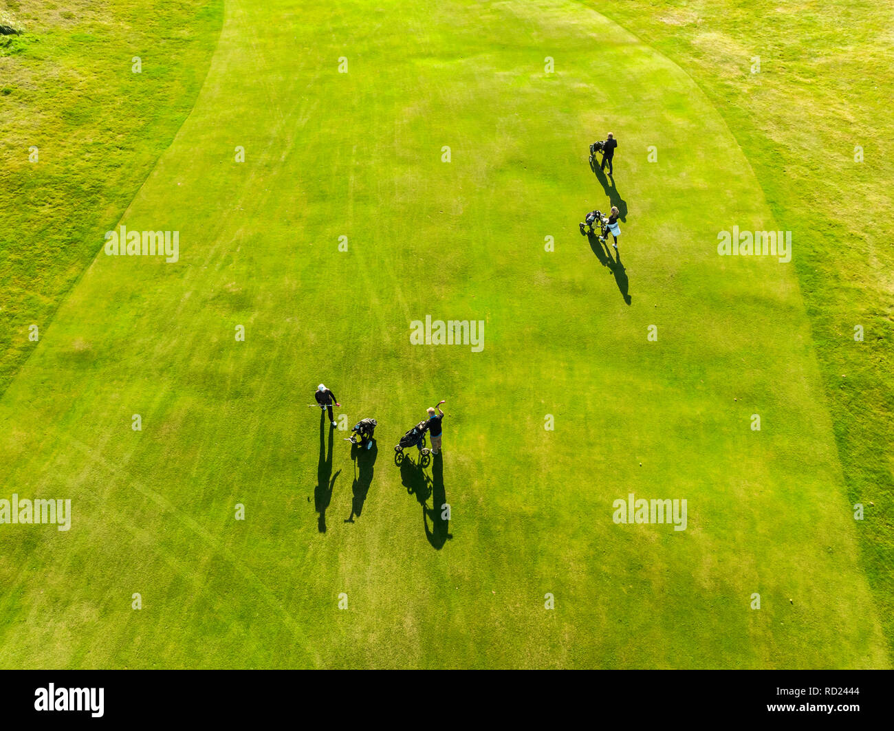 People playing Golf. Vestmannaeyjar Golf Course, Heimaey, Westman Islands, Iceland Stock Photo