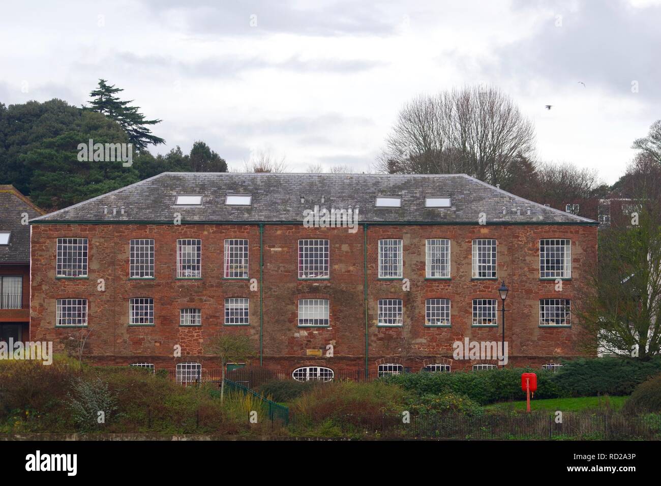 Trews Weir Paper Mill Building by the River Exe. Exeter, Devon, UK