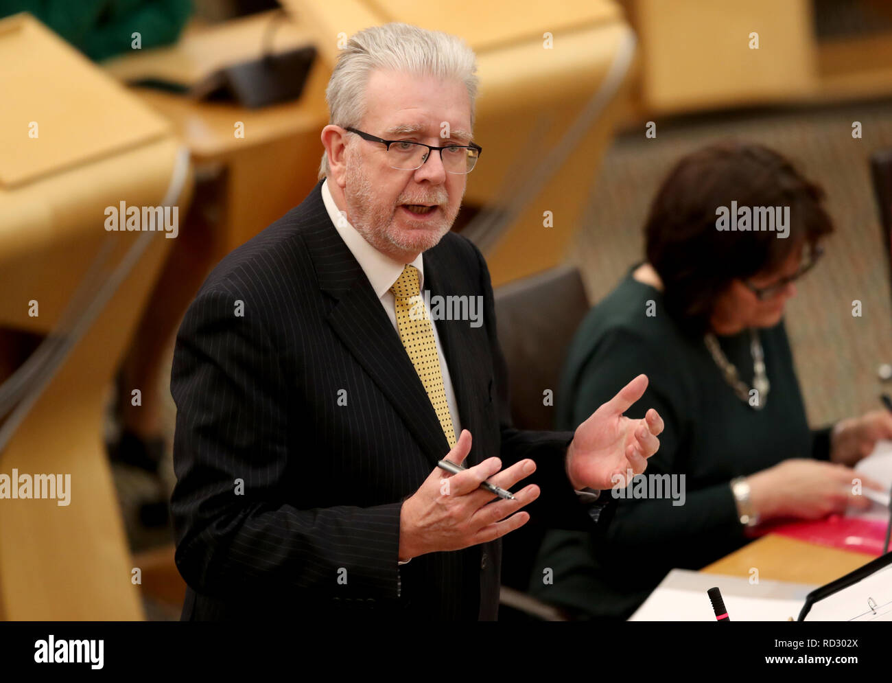 Cabinet Secretary for Government Business and Constitutional Relations Michael Russell delivers his statement in the Scottish Parliament, Edinburgh, in response to MPs in Westminster overwhelmingly rejecting the Prime Minister's proposed Withdrawal Agreement in the historic Commons vote. Stock Photo