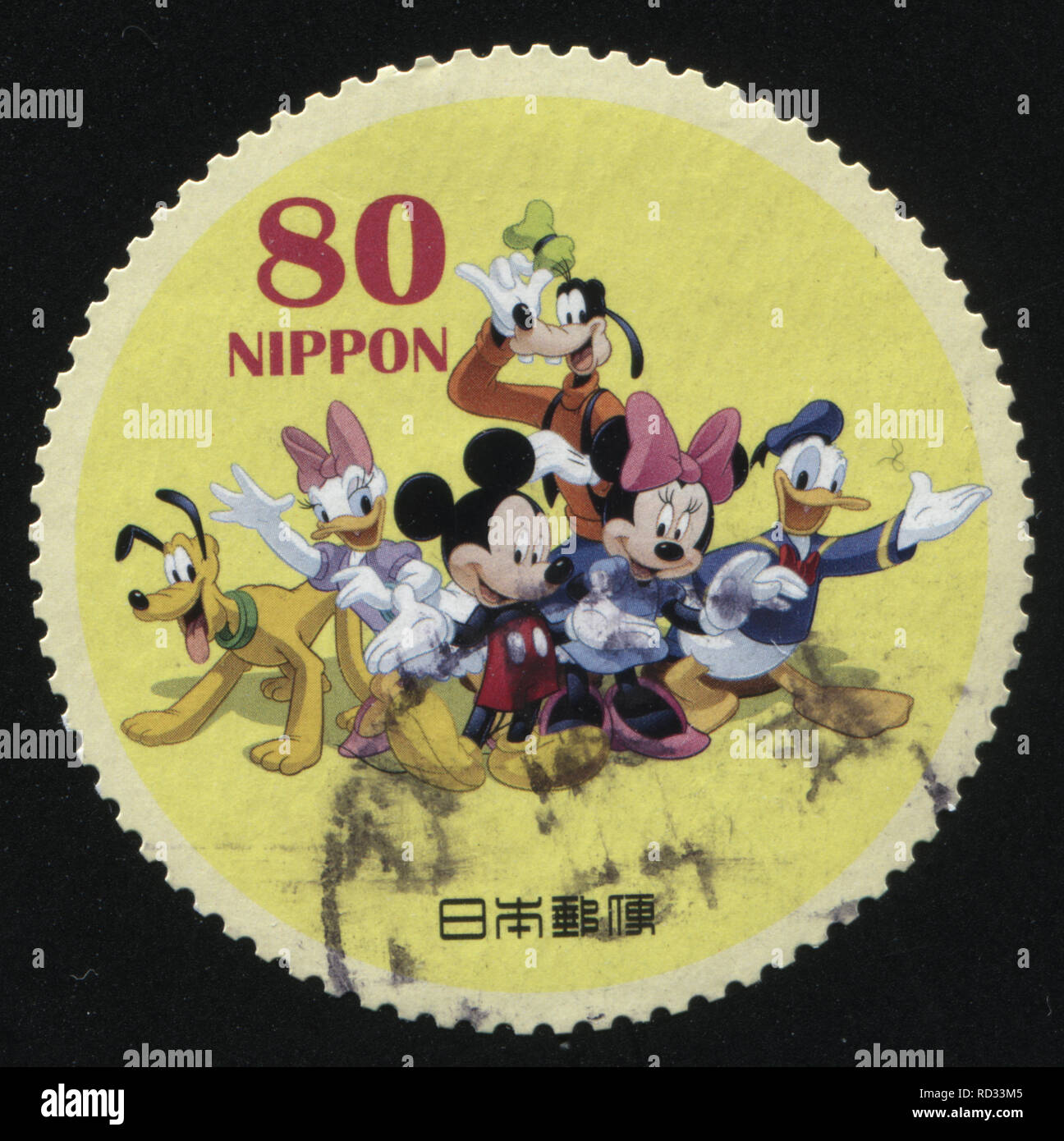 RUSSIA KALININGRAD, 22 APRIL 2016: stamp printed by Japan, shows Disney characters together, circa 2011 Stock Photo