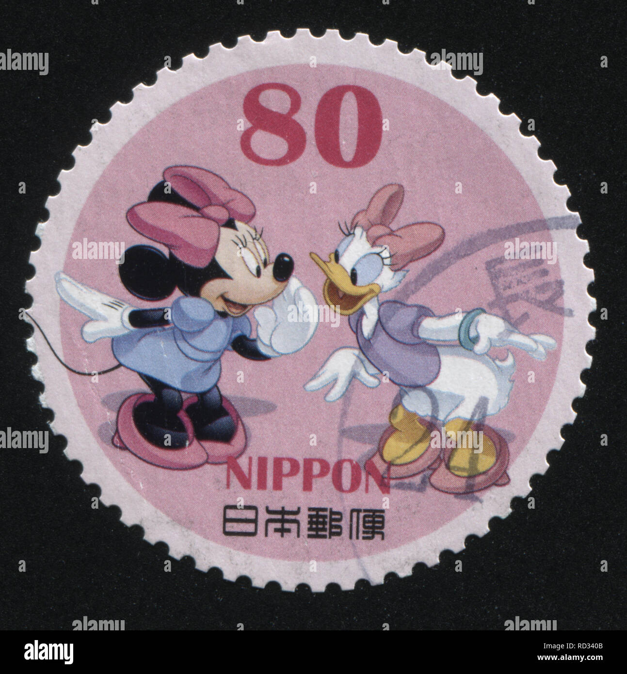 RUSSIA KALININGRAD, 22 APRIL 2016: stamp printed by Japan, shows Minnie Mouse and Daisy Duck, circa 2011 Stock Photo