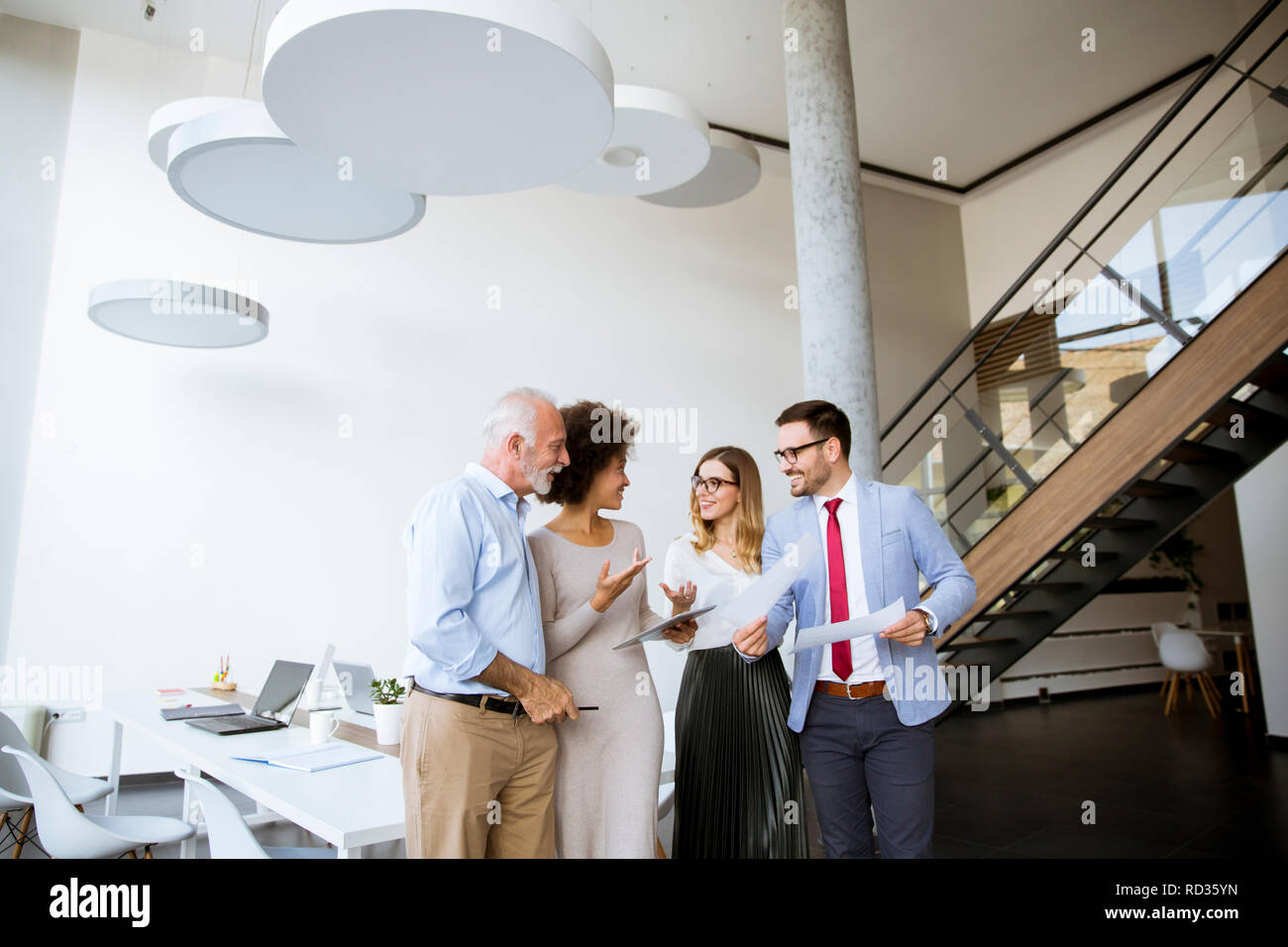 Group of successful business people standing in the modern office Stock ...