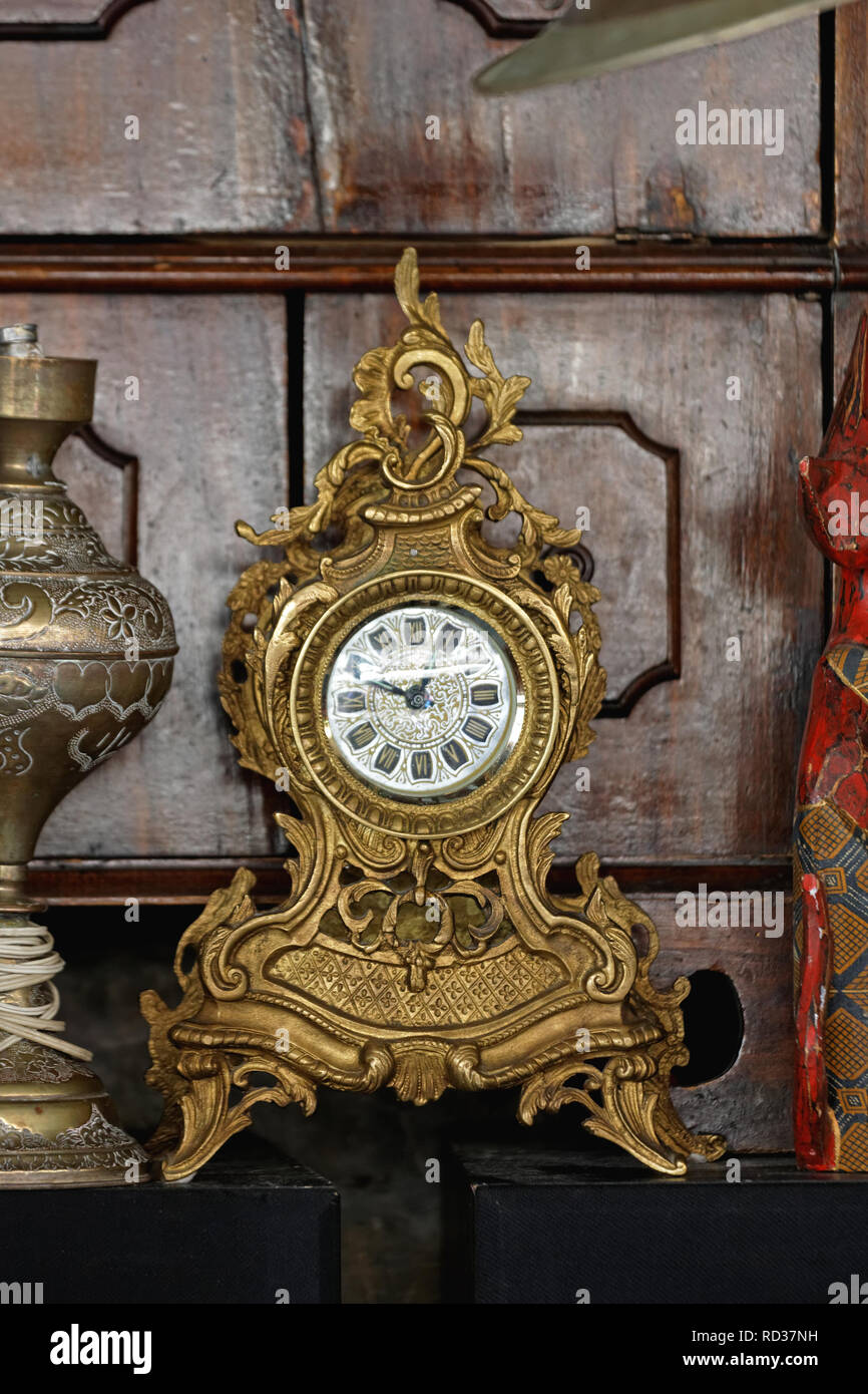 Antique Tabletop Gold Clock at Flea Market Stock Photo - Alamy