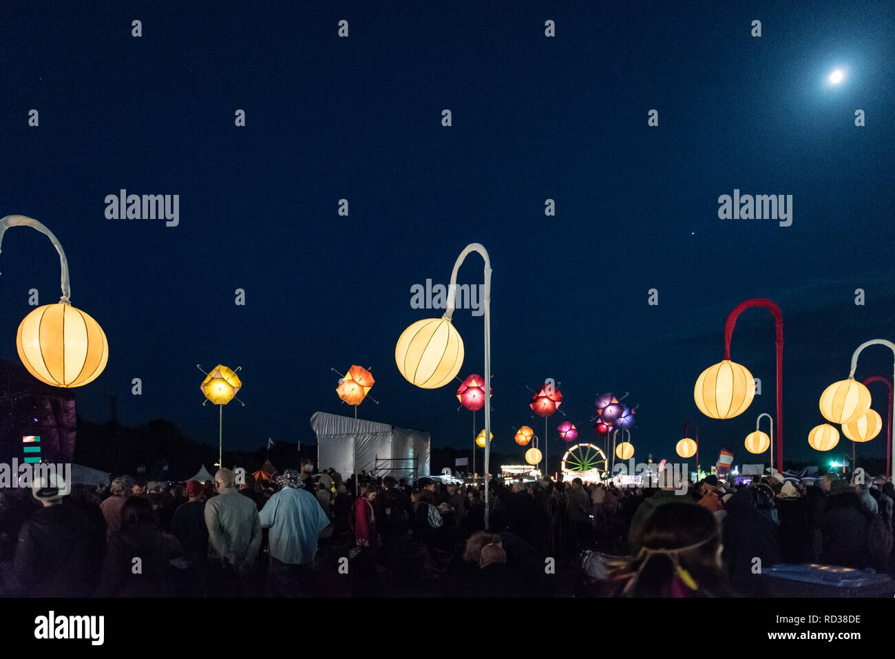 Music festival at night showing the crowd an lanterns Stock Photo