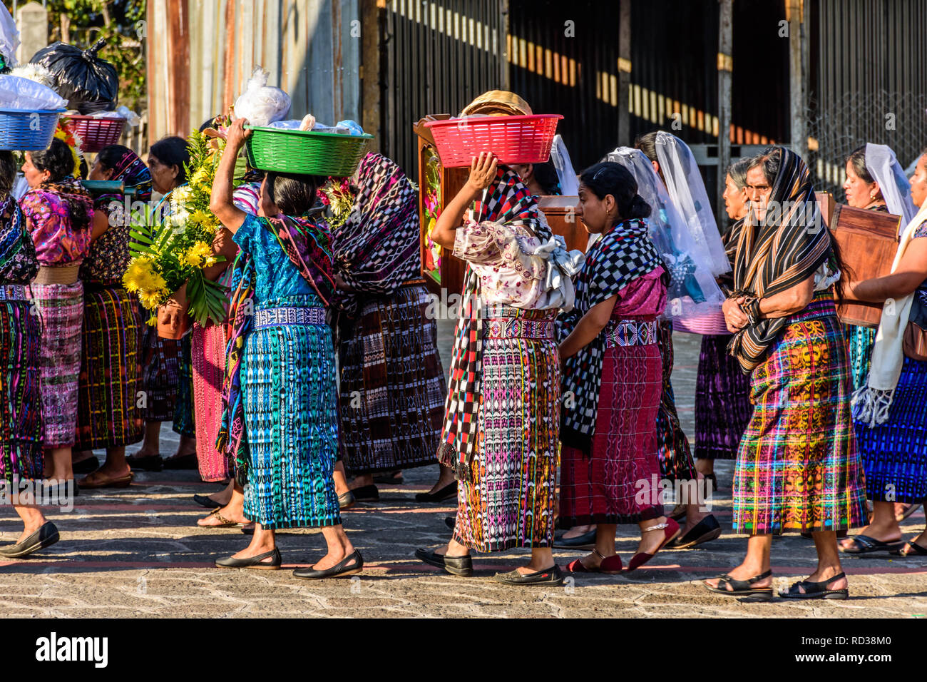 San Juan la Laguna, Lake Atitlan, Guatemala - December 31, 2018: Procession  of local Tz'utujil Maya women in traditional clothing in lakeside village  Stock Photo - Alamy