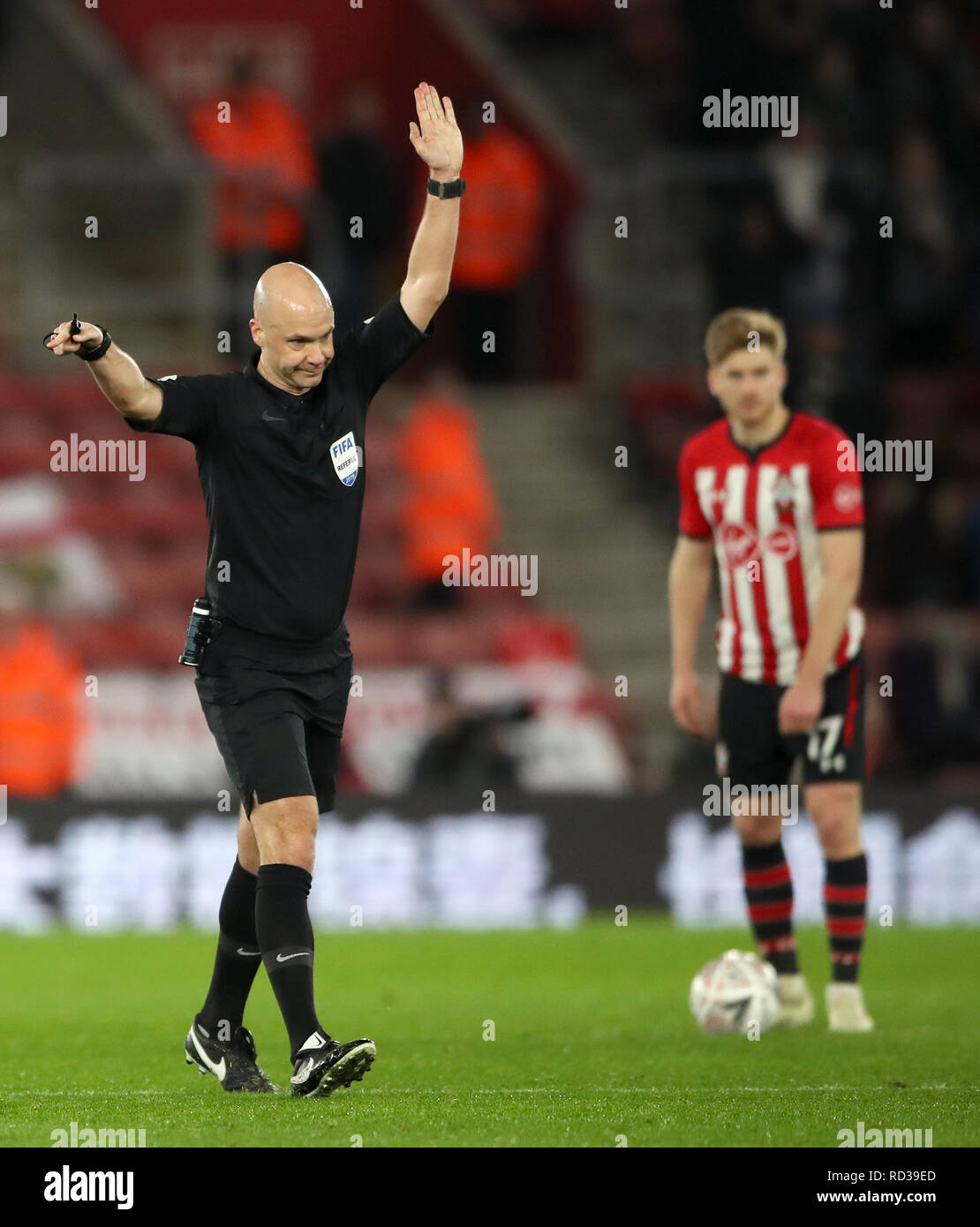Referee Anthony Taylor signals for offside during the Emirates FA Cup third  round replay match at St Mary's Stadium Stock Photo - Alamy