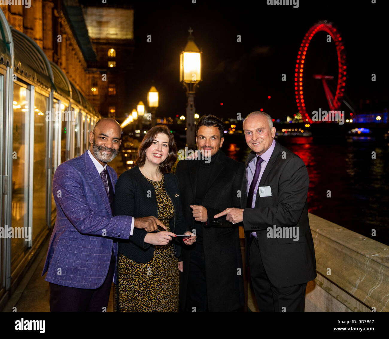 (From left to right) Paul Thompson, Founder of Water Babies, Lucy Powell MP, Central Manchester Constituency, Peter Andre and Steve Franks CEO of Water Babies outside the House of Commons at the launch of the Children First campaign in conjunction with Water Babies. Stock Photo