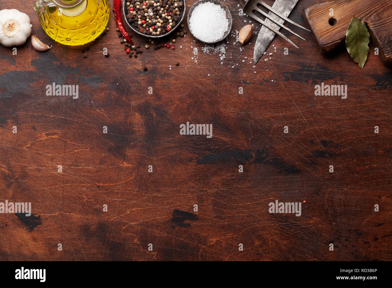 Set of various spices and herbs on wooden table. Top view with space ...